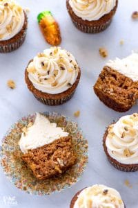 Gluten Free Carrot Cake Cupcakes cut open on marble slab
