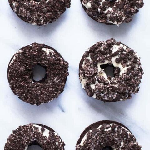 6 Yummy Gluten Free Cookies and Cream Donuts on a marble counter top