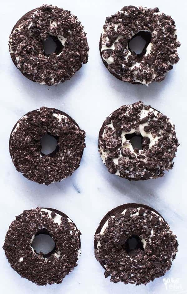 6 Yummy Gluten Free Cookies and Cream Donuts on a marble counter top