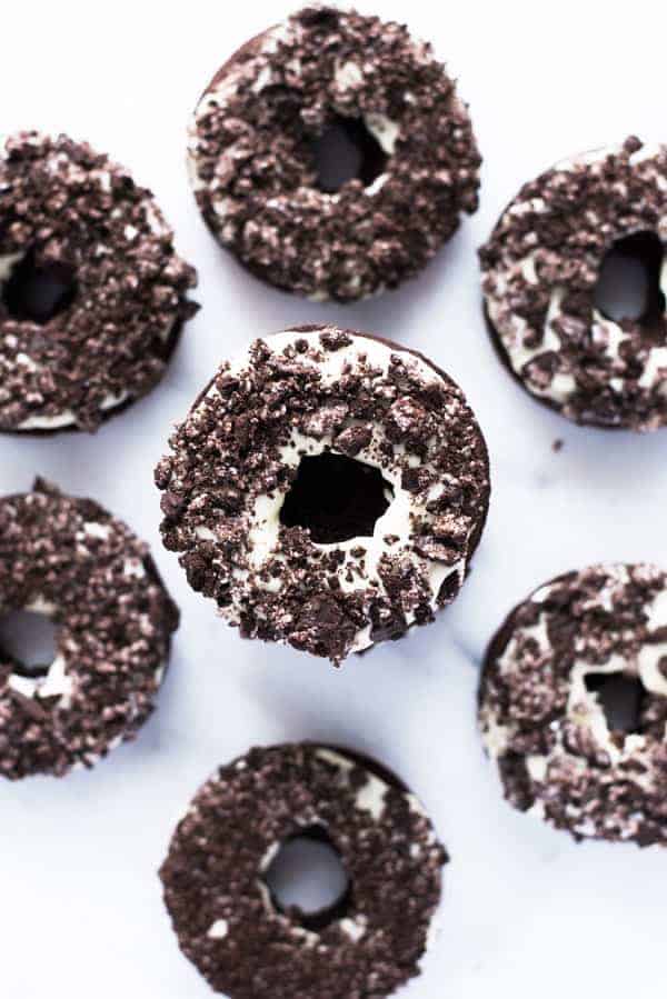 Tasty Gluten Free Cookies and Cream Donuts on counter, stacked high