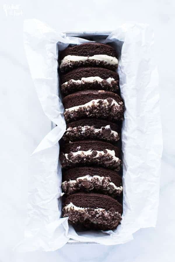 Delicious Gluten Free Cookies and Cream Donuts stacked in pan