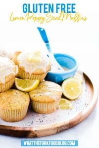glazed gluten free lemon poppy seed muffins on wood platter
