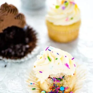 Elevate your standard cupcake and learn how to make Piñata Cupcakes! They’re easy to make and super fun to eat! Two versions included - chocolate piñata cupcakes and vanilla piñata cupcakes. These are perfect for birthdays, birthday parties, gender reveal cakes and baby showers! Customize the sprinkles for any holiday too. Easy dessert recipe from @whattheforkblog - visit whattheforkfoodblog.com for more #cupcakes #baking #dessert #diy #tutorial #easyrecipe #glutenfree #cakedecorating #sprinkles