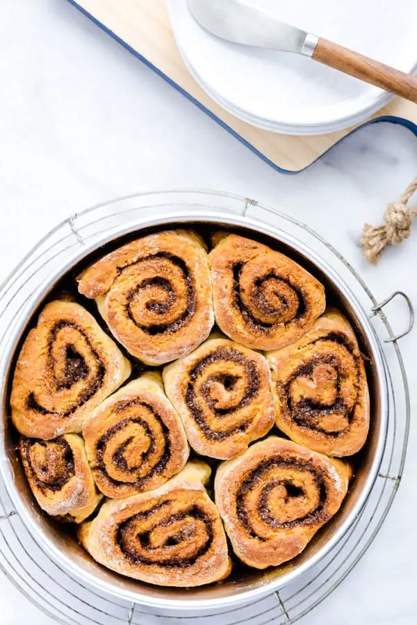 Gluten Free Cinnamon Rolls without frosting in a round baking pan