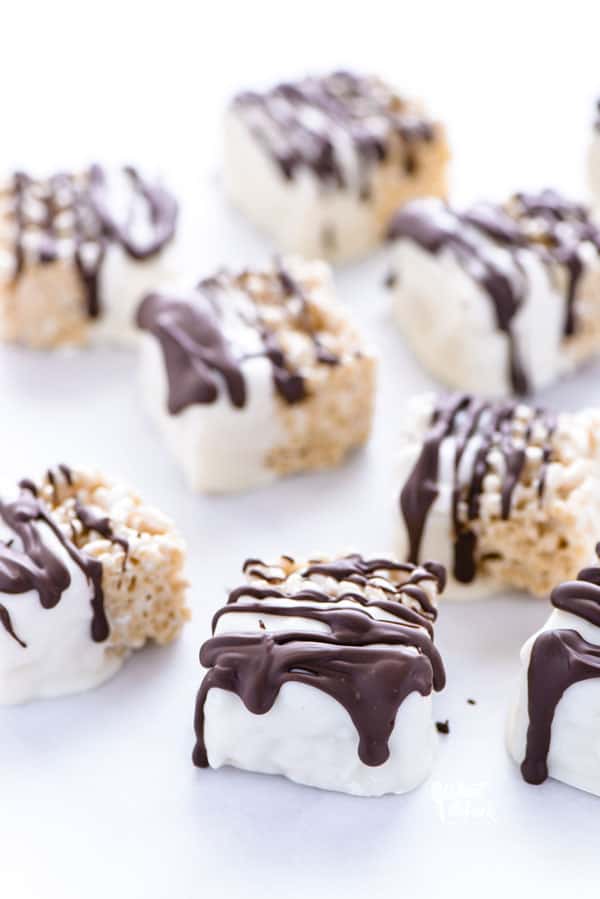 If you want to step up your rice krispies treats game, make some Chocolate Dipped Rice Krispie Treats! They’re no-bake and super simple to make. Use color candy melts to customize them for parties or holidays. This easy dessert recipe is great for parties, bake sales, and baby showers. Add a lollipop stick to make Rice Krispie Treat pops. Made with gluten free rice cereal but can be made with Kellogg's Rice Krispies. From @whattheforkblog visit whattheforkfoodblog.com for more. #dessert #nobake