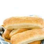 These Homemade Gluten Free Hot Dog Buns are soft and don’t fall apart like store-bought buns. They’re easy to make and worth the effort. They’re great for sausages, brats, tuna boats, or whatever else you want to fill your roll with! Bonus, they even stand up on their own so your hot dogs stays put. Gluten Free Bread recipe from @whattheforkblog - visit whattheforkfoodblog.com for more #glutenfree #glutenfreerolls #glutenfreebread #glutenfreebaking