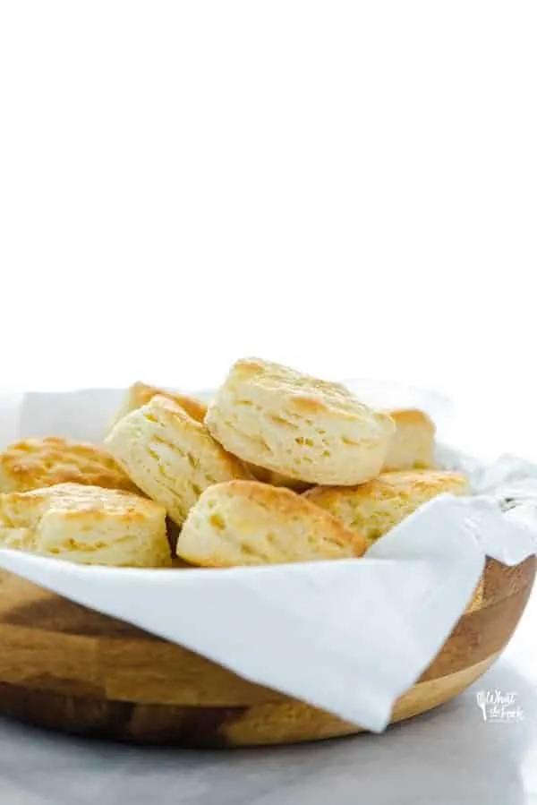 This is the best recipe for gluten free buttermilk biscuits! These biscuits are light, fluffy, with amazing flavor and texture. They've got a nice crisp bottom and beautifully browned top. If you've been missing true biscuits since starting a gluten free diet, this is the recipe you need to try! This post is full of gluten free baking tips plus a recommendation for the best gluten free flour blend for these biscuits. #glutenfree #biscuits #glutenfreebiscuits #glutenfreebaking #glutenfreerecipes