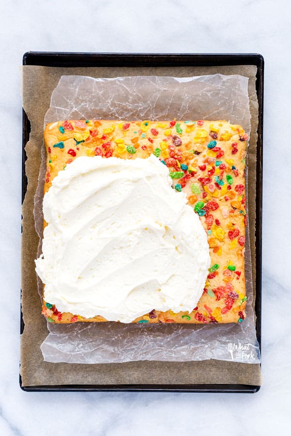 AD Finally, a gluten free cereal milk cake! This Gluten Free Fruity Pebbles Cake with Cereal Milk is a trendy cake that those on a gluten free diet can enjoy! It’s a fluffy gluten free white cake made with Fruity Pebbles cereal milk and topped with even more Fruity Pebbles cereal. Finish it off with the best, creamy vanilla buttercream frosting and even more Fruity Pebbles. It’s a gluten free dessert that anyone would enjoy, especially cereal lovers! #glutenfree #cerealmilk #cake #glutenfreecake