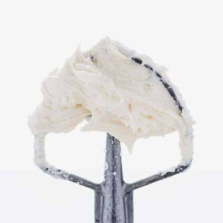 Homemade Cream Cheese Frosting recipe on a metal beater