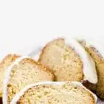 This simple and easy Gluten Free Eggnog Bread with Eggnog Icing is a wonderful holiday quick bread recipe. Baking with eggnog is one of the best ways to use leftover eggnog! The eggnog icing is spectacular but can be left off. This can also be baked as 4 mini loaves, the perfect size for gifting. Gluten Free Bread recipe from @whattheforkblog - visit whattheforkfoodblog.com for more! #glutenfree #glutenfreebread #eggnog #Christmas #holidaybaking #quickbread