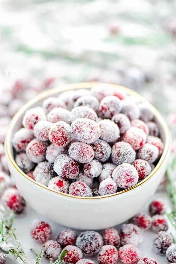 Sugared cranberries in a white bowl