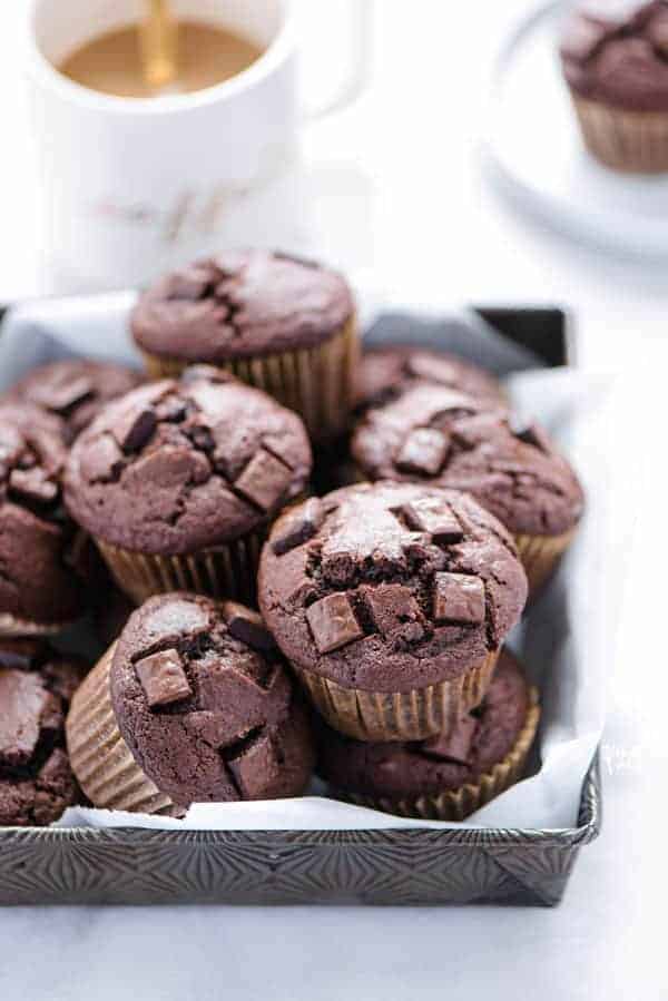Gluten Free Mocha Muffins in a metal tray lined with parchment paper