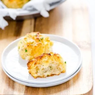 These Cheddar Bay Biscuits are the gluten free version of Red Lobster Biscuits. They're a basic gluten free drop biscuit flavored with spices, herbs, and cheese. Copycat Red Lobster cheddar biscuits are simple to make at home whenever the craving strikes. If you’re tired of mediocre gluten free biscuit recipes, try this one and others from @whattheforkblog - you won’t be disappointed with flavor and texture like regular biscuits. Visit whattheforkfoodblog.com for more #glutenfree #biscuits