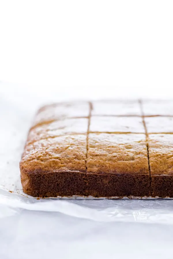 sliced gluten free banana bars on wax paper