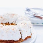 This is a simple, easy recipe for Coconut Pound Cake - aka Coconut Bundt Cake. It’s full of coconut flavor from coconut extract and shredded coconut and is topped with the most delicious, creamy coconut icing and garnished with toasted coconut. It’s a perfect dessert for a crowd or for holidays, birthday cake, and gatherings. It’s moist, dense, and has a tender crumb that’s addicting. Gluten Free Cake recipe from @whattheforkblog - visit whattheforkfoodblog.com for more gluten free desserts.