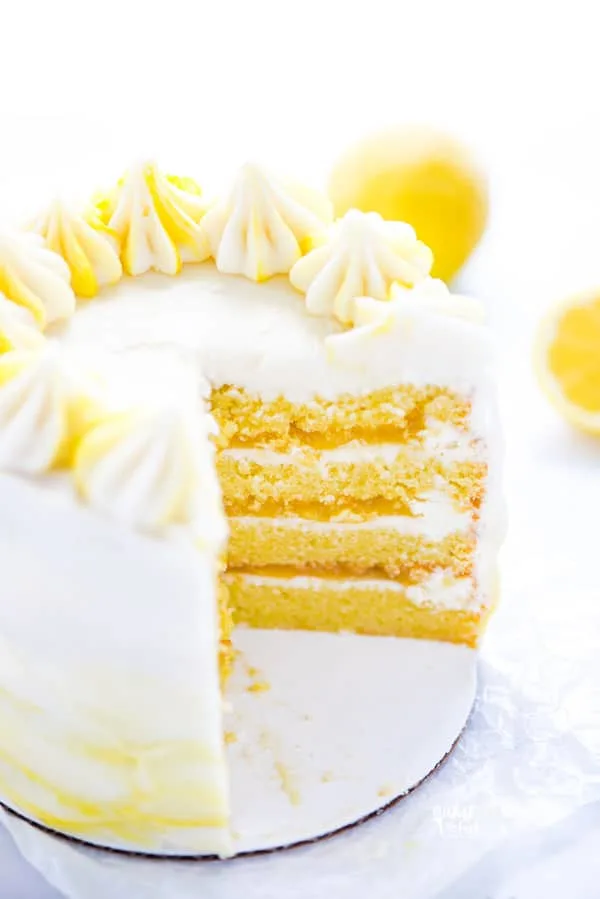 This simple Gluten Free Lemon Cake is one of THE BEST cakes I’ve ever had! Moist, tender cake layered with lemon curd and cream cheese frosting. It’s absolutely delicious and you’d never know it was gluten free! This recipe makes 2 6-inch cake layers that are sliced and turned into a 4 layer cake. You can double the recipe and bake it as a 9 inch cake or 8 inch cake. This lemon cake recipe is perfect for Easter, Mother’s Day, graduation parties, wedding showers, baby showers, and birthday cakes.