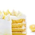 This simple Gluten Free Lemon Cake is one of THE BEST cakes I’ve ever had! Moist, tender cake layered with lemon curd and cream cheese frosting. It’s absolutely delicious and you’d never know it was gluten free! This recipe makes 2 6-inch cake layers that are sliced and turned into a 4 layer cake. You can double the recipe and bake it as a 9 inch cake or 8 inch cake. This lemon cake recipe is perfect for Easter, Mother’s Day, graduation parties, wedding showers, baby showers, and birthday cakes.