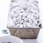 Super simple Gluten Free Puppy Chow - AKA Muddy Buddies is everyone’s favorite sweet snack. You only need a few ingredients to make it - Chex cereal, chocolate chips, butter, vanilla, peanut butter, and powdered sugar. You can even make vegan muddy buddies by using vegan butter and dairy free chocolate chips. This no bake recipe takes less than 15 minutes to make too! The recipe calls for semi-sweet chocolate but you can use milk chocolate or dark chocolate if you prefer.