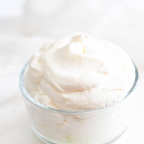 homemade whipped cream recipe in a glass dish ready to be served