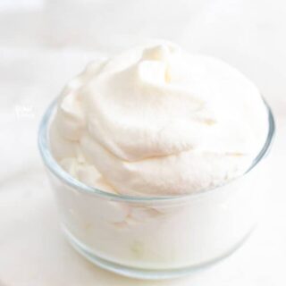 homemade whipped cream recipe in a glass dish ready to be served