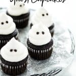 Gluten Free Halloween Ghost Cupcakes on a black wire rack lined with wax paper - image with text for Pinterest