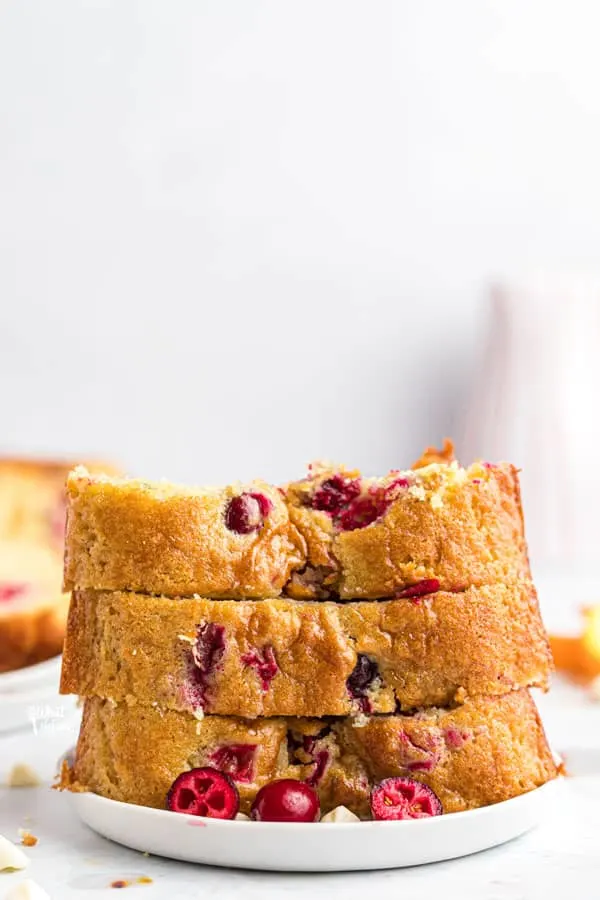 sliced and stacked gluten free white chocolate cranberry bread