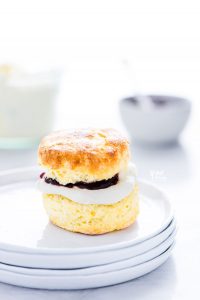 a gluten free scone sandwiched with clotted cream and jam