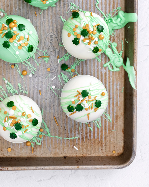 St. Patrick's Day Hot Cocoa Bombs on a metal sheet pan