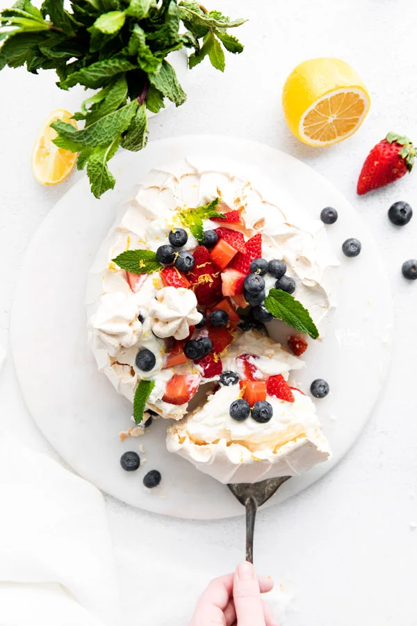 overhead shot of a classic pavlova recipe being served