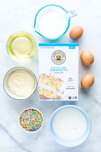 overhead shot of ingredients to make a gluten free confetti cake pop recipe
