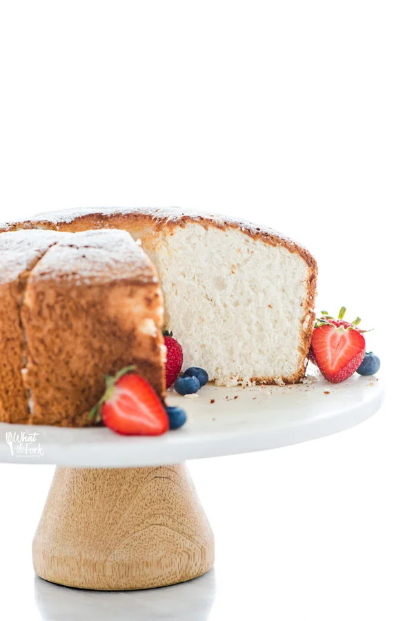 straight on shot of gluten free angel food cake that's been sliced into