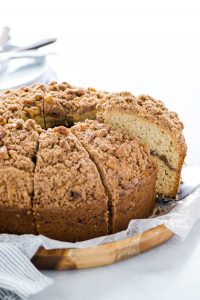 a slice of gluten free sour cream coffee cake being served