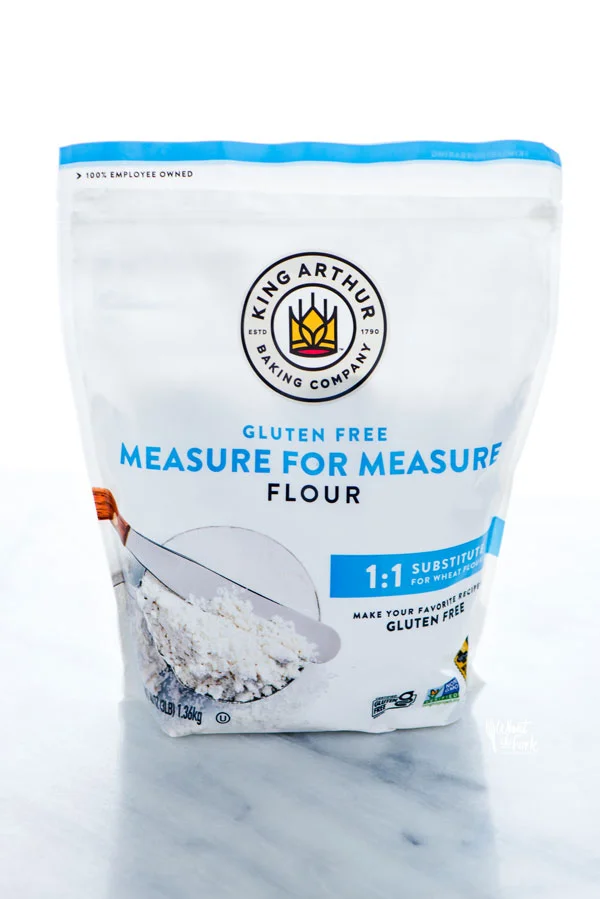 a bag of King Arthur Gluten Free Measure for Measure Flour with new white packaging