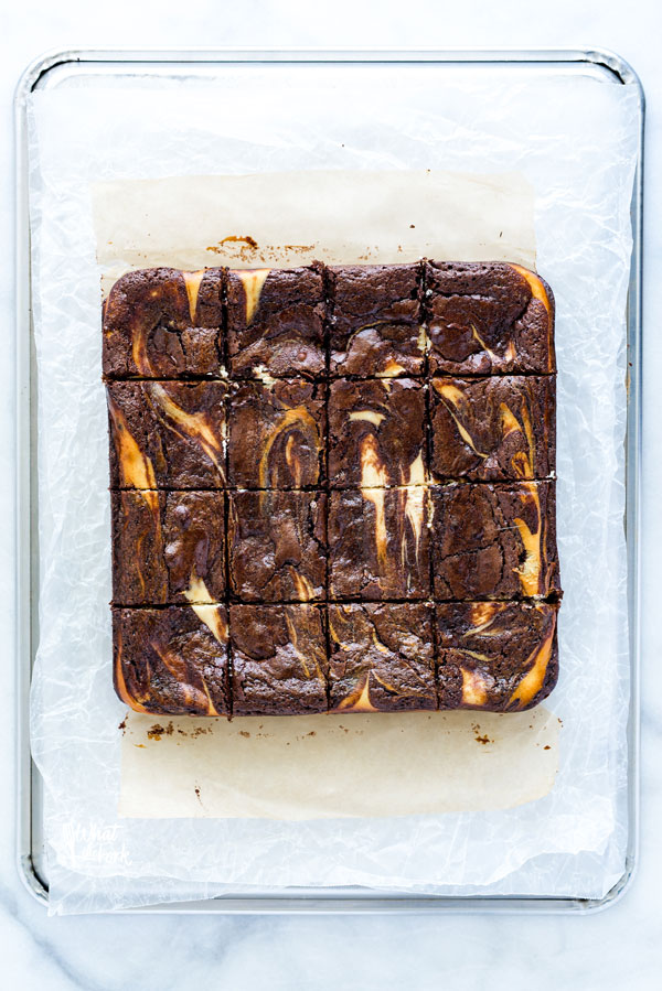 overhead shot of baked Gluten Free Cheesecake Brownies that have been sliced