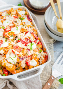 Caprese Pasta Bake Recipe with White Beans in a white casserole dish ready to be served