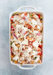 Caprese Pasta Bake Recipe with White Beans in a white casserole dish ready to be baked