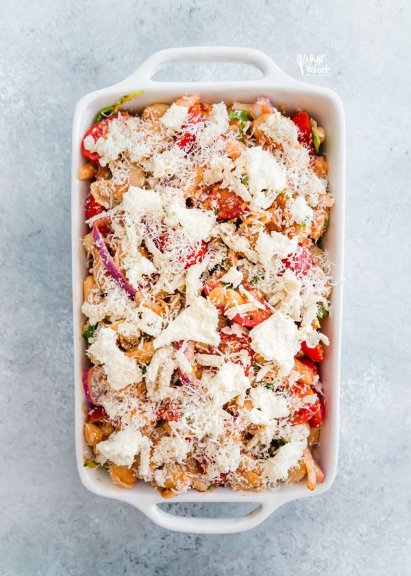 Caprese Pasta Bake Recipe with White Beans in a white casserole dish ready to be baked