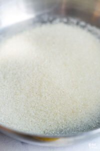 granulated sugar in a metal pan
