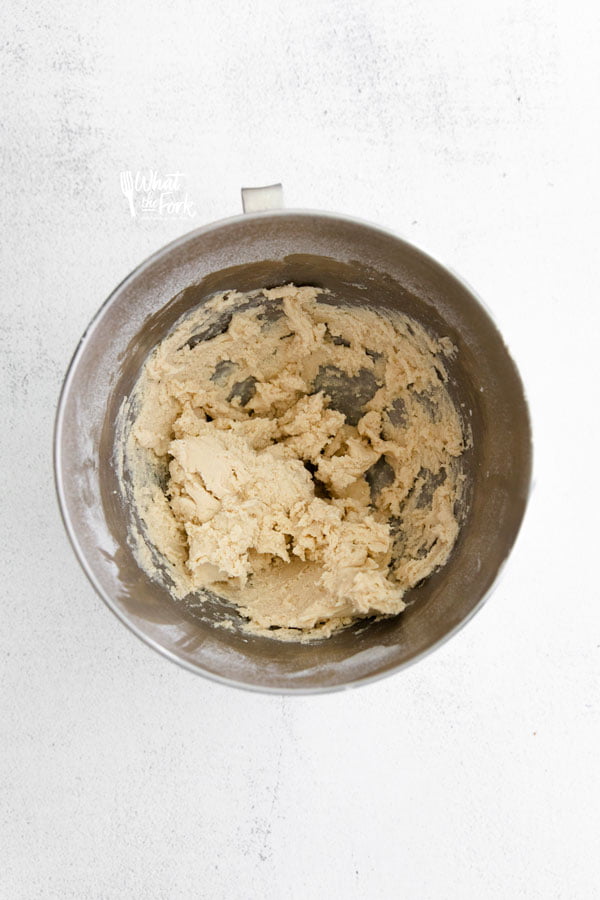 dough for Gluten Free Butterscotch Shortbread Cookies mixed in a silver mixing bowl