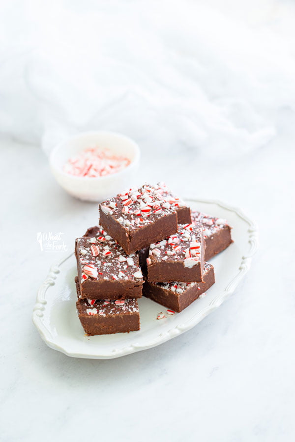 slices of peppermint fudge on a small white oval plate