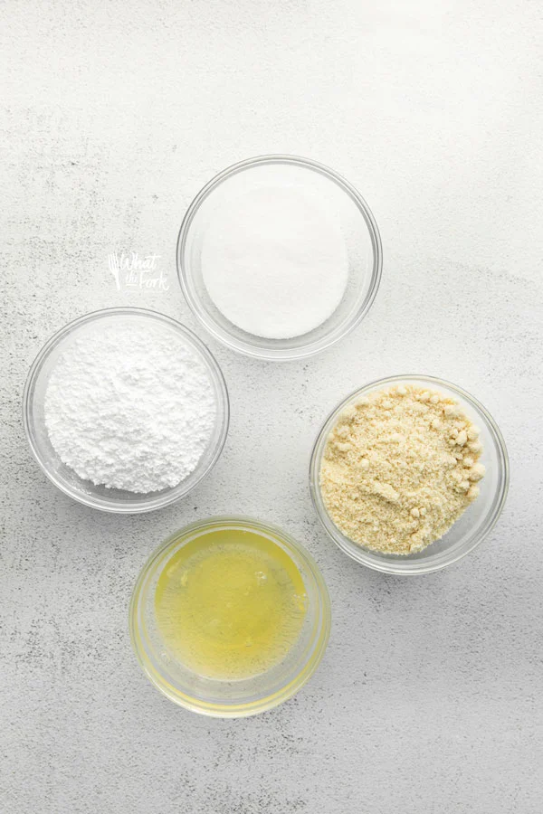 overhead shot of ingredients in individual bowls to make French Macarons