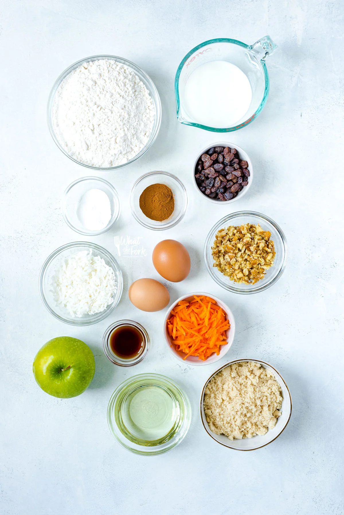 overhead shot of ingredients in individual bowls to make Gluten Free Morning Glory Muffins