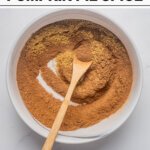 Homemade Pumpkin Pie Spice (Easy DIY Recipe) in a white bowl with text for Pinterest