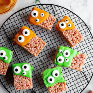Monster Halloween Rice Krispie Treats made with orange and green candy melts with candy eyes