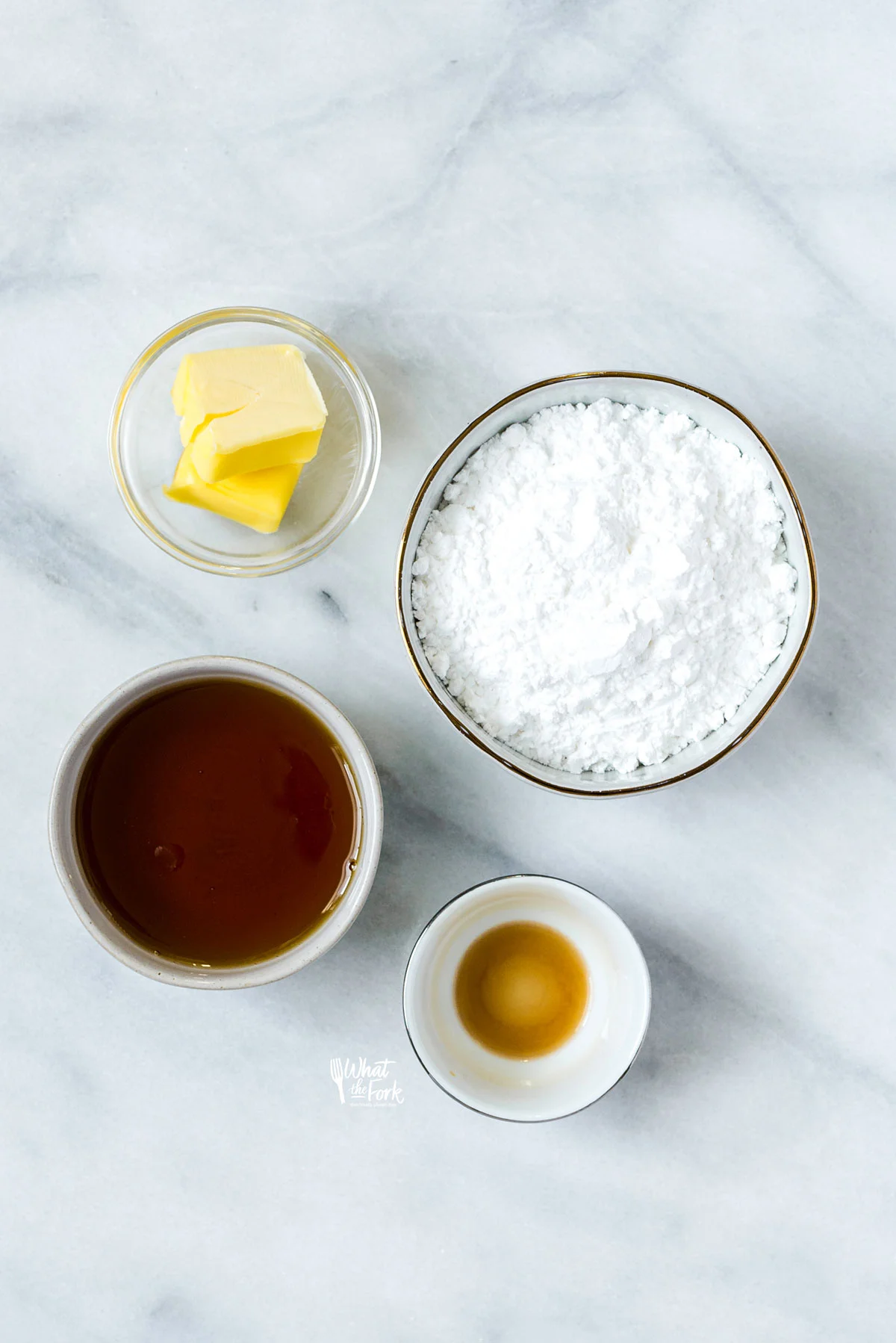 overhead shot of the 4 ingredients in individual bowls to make maple glaze