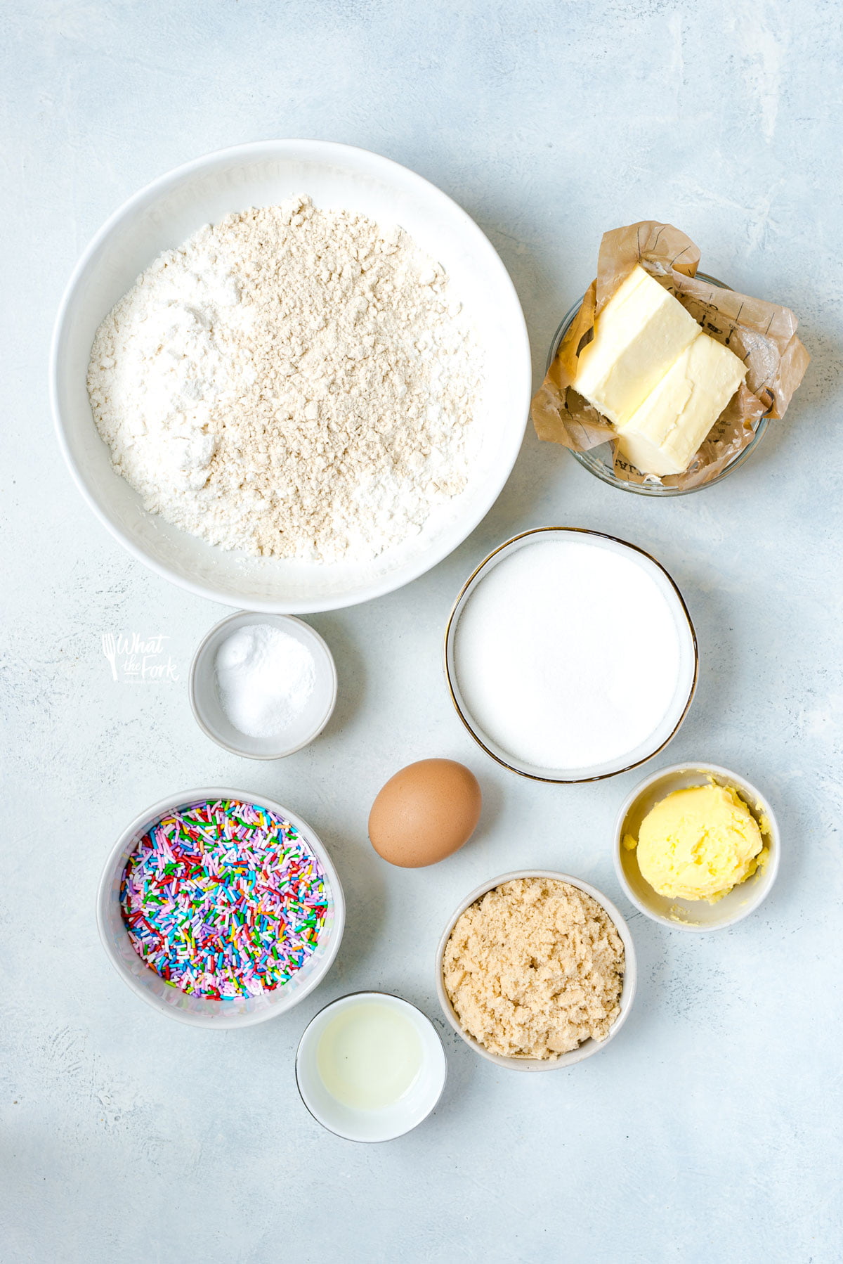overhead shot of ingredients to make Chewy Gluten Free Sugar Cookies in individual bowls