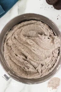 Cookies and Cream Frosting Recipe made in a large silver bowl