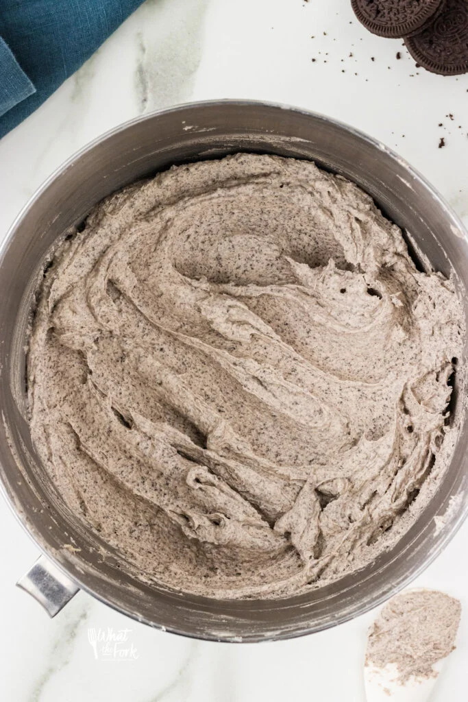 Cookies and Cream Frosting Recipe made in a large silver bowl