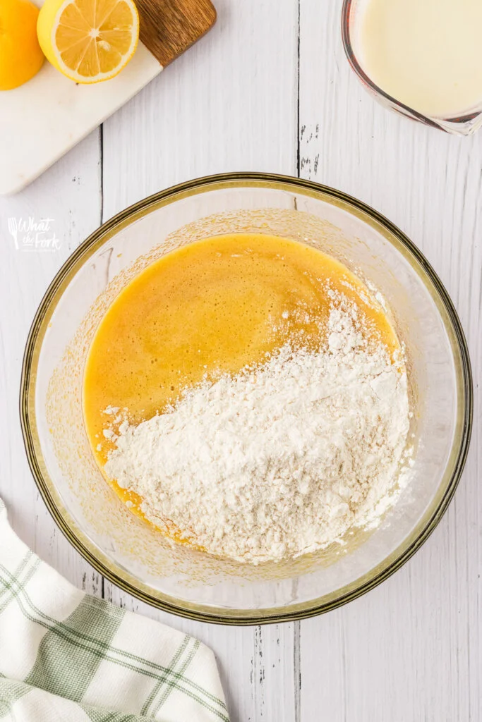 dry ingredients added to the wet ingredients to make gluten free lemon cake