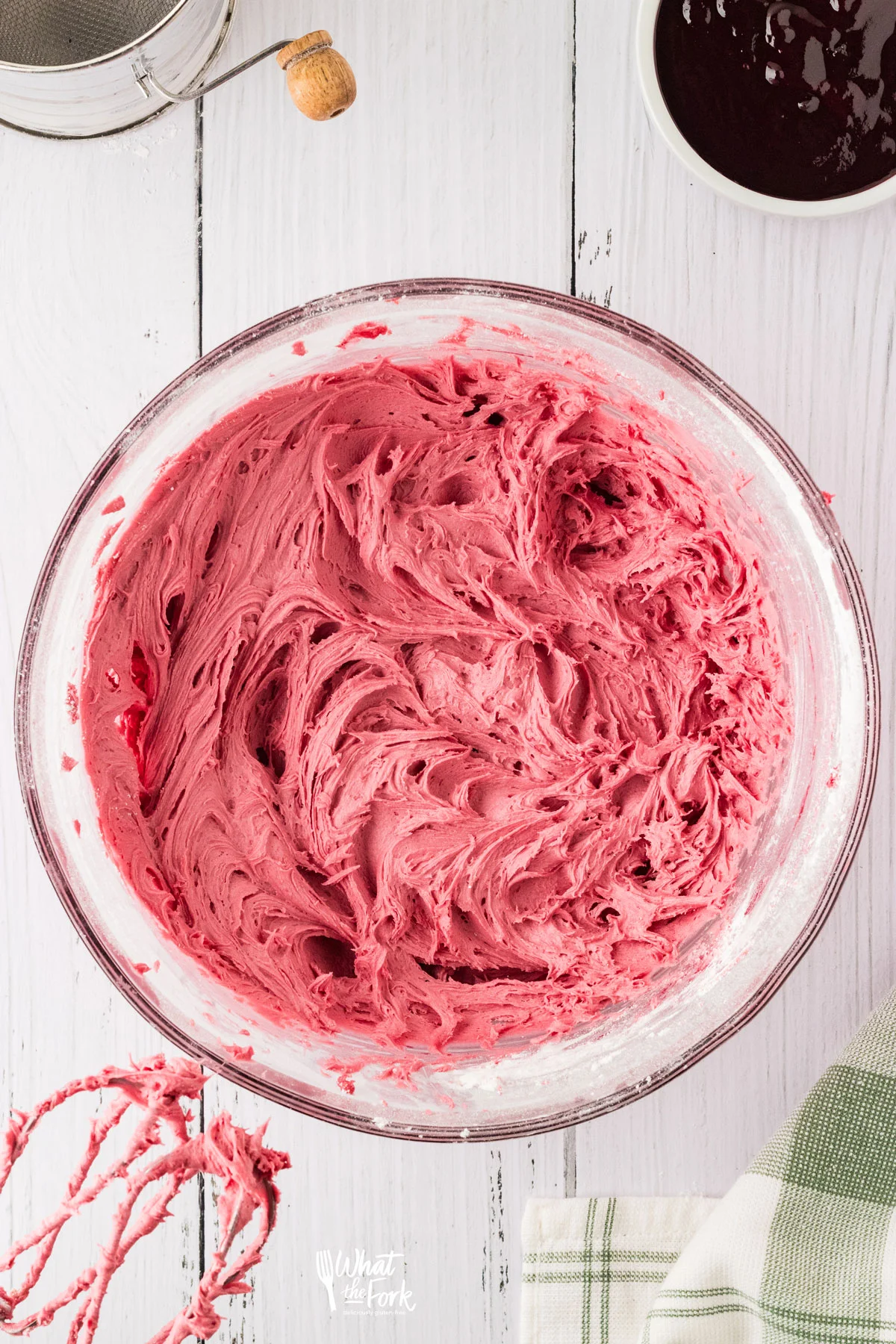 Blackberry Buttercream Frosting in a large clear glass bowl